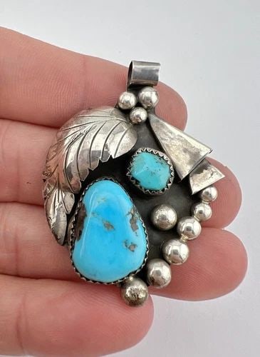 VINTAGE ZUNI STERLING SILVER BLUE KINGMAN TURQUOISE STAMPED PENDANT 2": VINTAGE ZUNI STERLING SILVER BLUE KINGMAN TURQUOISE STAMPED PENDANT 2" Vintage ZUNI Sterling Silver Blue Kingman Turquoise Stamped Pendant 2" Size: About 2" Tall With bail by 1 3/8" Wide Weight is 13.