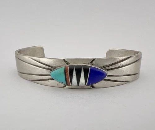 VTG NAVAJO STERLING SILVER MULTI GEMS FLUSH INLAY STAMPED CUFF BRACELET 28.3G: VTG NAVAJO STERLING SILVER MULTI GEMS FLUSH INLAY STAMPED CUFF BRACELET 28.3G Vtg Navajo Sterling Silver Multi Gems Flush Inlay Stamped Cuff Bracelet 28.3g Cuff is 5 1/4" tip to Tip and has a Around 1