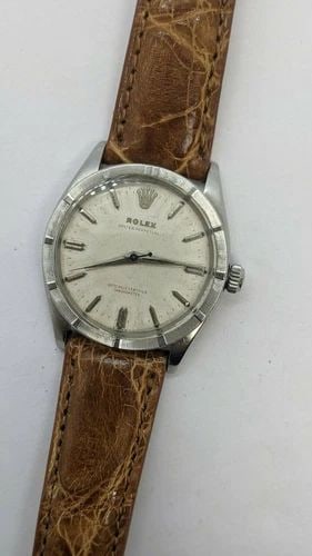 VINTAGE ROLEX OYSTER PERPETUAL 6569 STAINLESS STEEL AUTOMATIC WATCH - 34MM (1 of 2)
