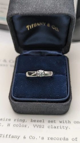 TIFFANY & CO. SOLITAIRE PLAT DIAMOND 0.35CT H COLOR VVS2 RING - SIZE 5 COMPLETE: Tiffany & Co. Solitaire Platinum Diamond Ring Tiffany & Co. Certified Registration Number - 18645157/E12080215 Shape - Round Cut - Brilliant Measurement - 4.47 - 4.50 x 2.79mm Weight - 0.35 Carat Cut 