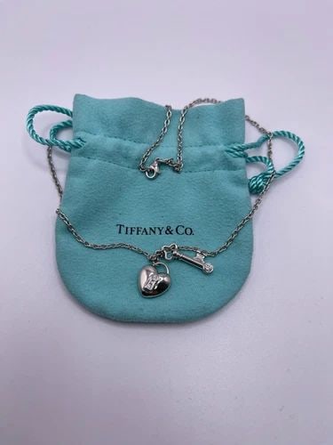 TIFFANY & CO. PLATINUM HEART LOCK AND KEY DIAMOND PENDANT NECKLACE - 16" LONG (1 of 2)