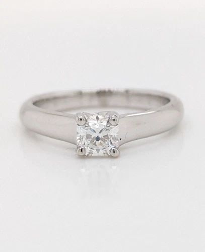 TIFFANY & CO. LUCIDA 0.38 CARAT DIAMOND SOLITAIRE PLATINUM - SIZE 4.25 W/RECEIPT: 1999 Tiffany & Co. Lucida 0.38 Carat Diamond Solitaire Platinum Ring Ring Size - 4.25 ( Resizable) Band Width - 2.5mm Color - E Clarity - VS2 Total Weight - 4.1 grams Excellent Condition Purchase Date