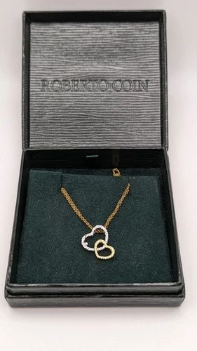 ROBERTO COIN 18K GOLD DOUBLE HEART DIAMOND PENDANT NECKLACE - 16" LONG BOX: ROBERTO COIN 18K GOLD DOUBLE HEART DIAMOND PENDANT NECKLACE - 16" LONG BOX Roberto Coin 18K Yellow & White Gold Double Heart Pendant Necklace Length - 16" Long Pendant Size - 15mm Total Weight - 6.3 G