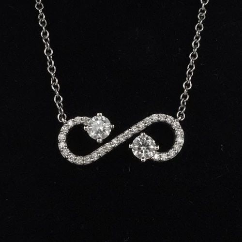 TIFFANY & CO. PLATINUM ENCHANT DIAMOND PENDANT NECKLACE 16" BOX: TIFFANY & CO. PLATINUM ENCHANT DIAMOND PENDANT NECKLACE 16" BOX Tiffany & Co. Platinum 950 Enchant Diamond Pendant Necklace Length - 16" Long Pendant Size - 1.5cm x 0.7cm Total Weight - 3.1 Grams Box 