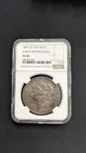 1891 CC MORGAN SILVER TOP-100 $1 VAM-3 SPITTING EAGLE DOLLAR COIN - NGC XF 45: 1891 CC Morgan Silver Top-100 $1 Vam-3 Spitting Eagle $1 Dollar Coin NGC Certified - XF 45