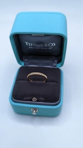TIFFANY & CO. SOLESTE 18K GOLD HALF ETERNITY 0.17 CT DIAMOND RING SIZE 4 BOX: Tiffany & Co. Soleste 18k Gold Half Eternity 0.17 Ct Diamond Ring Ring Size - 4 Width - 2mm Total Weight - 2.1 Grams Excellent Condition & Very Well Kept