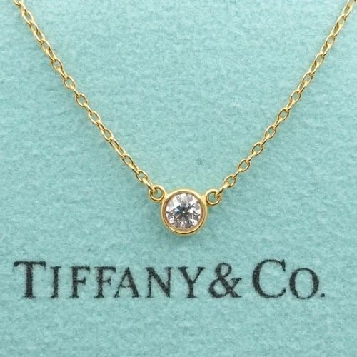 TIFFANY & CO. PERETTI DIAMONDS BY THE YARD SINGLE DIAMOND BRILLIANT NECKLACE: TIFFANY & CO. PERETTI DIAMONDS BY THE YARD SINGLE BRILLIANT SOLITAIRE NECKLACE Tiffany & Co. Elsa Peretti Diamonds By The Yard Bezel Round Brilliant Cut Solitaire Necklace Length - 18.75" Long Chain W