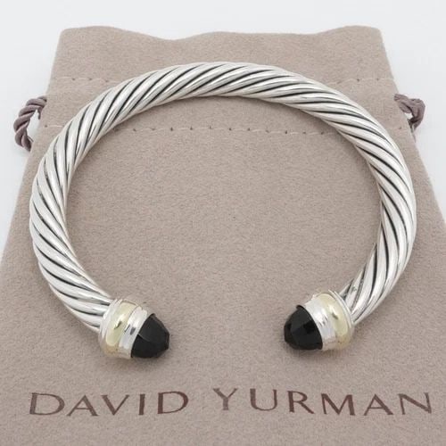 DAVID YURMAN STERLING SILVER 14K YELLOW GOLD ONYX 7MM CABLE CUFF MEDIUM BRACELET: David Yurman Cable Classic Sterling Silver & 14K Yellow Gold Black Onyx Gemstone Cuff Medium Bracelet Fits up to Relax 6" - 6.5" Snug Wrist Width - 7mm Thick Est. Retail - $800 USD Total Weight - 40.3