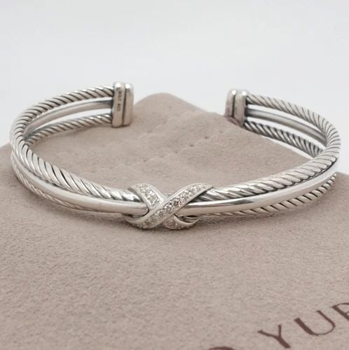 DAVID YURMAN X STERLING SILVER DIAMOND CROSSOVER CABLE CUFF BRACELET 6.5" WRIST: David Yurman X Collection Sterling Silver Pave Diamond Crossover Cable Cuff Medium Bracelet Fits up to Relax 6.25 - 6.5" Snug Wrist Width - 5mm & 7mm Est. Retail Price - $975 USD + Tax Total Weight - 