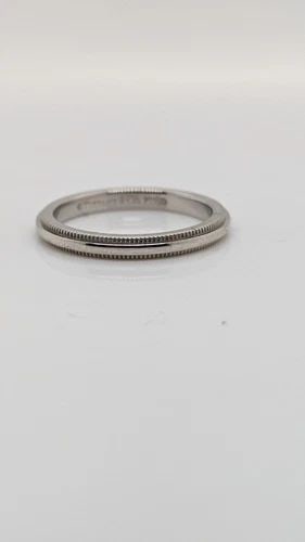TIFFANY & CO. TOGETHER PLATINUM 2.2MM MILGRAIN WEDDING BAND RING SIZE 4.5: Tiffany & Co. Tiffany Together Platinum Milgrain Wedding Band Ring Ring Size - 4.5 Width - 2.2mm Weight - 3.5 Grams Professionally polished & Looks like New Pouch Not Included