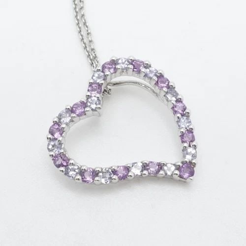 B.H 14K WHITE GOLD AMETHYST & TANZANITE OPEN HEART PENDANT NECKLACE 16" RECEIPT: B.H 14K WHITE GOLD AMETHYST & TANZANITE OPEN HEART PENDANT NECKLACE 16" RECEIPT Signed B.H 14K White Gold Amethyst and Tanzanite Heart Pendant Chain Necklace Length - 16" Long Chain Width - 1mm Pendan