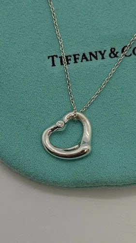 TIFFANY & CO. ELSA PERETTI SILVER OPEN HEART SMALL PENDANT DIAMOND NECKLACE 16": Tiffany & Co. Elsa Peretti Sterling Silver Open Heart Diamond Small Pendant Necklace Pendant Size -16mm Wide Chain Length - 16" Long Total Weight - 3.4 Grams Professionally Polished & Looks Brand New 