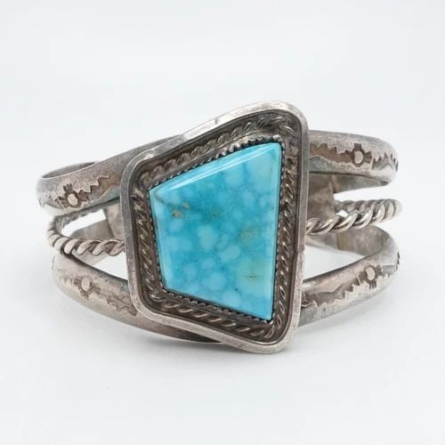 STERLING SILVER ASYMMETRICAL TURQUOISE NAVAJO CUFF BRACELET 5.75" WRIST: STERLING SILVER ASYMMETRICAL TURQUOISE NAVAJO CUFF BRACELET 5.75" WRIST Sterling Silver Asymmetrical Turquoise Navajo Style Split Shank Cuff Bracelet Fits up to 5.75" Wrist Diameter - 1.92" (49mm) Hei