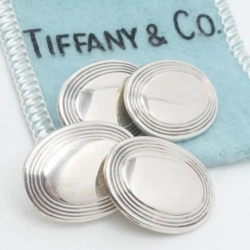 TIFFANY & CO. STERLING SILVER OVAL CUFFLINKS POUCH: TIFFANY & CO. STERLING SILVER OVAL CUFFLINKS POUCH Tiffany & Co. Sterling Silver Classic Oval Chain Cufflinks No Monogram Height - 14.5mm Width - 20mm Total Weight - 14.7 Grams Hallmark - TIFFANY STER