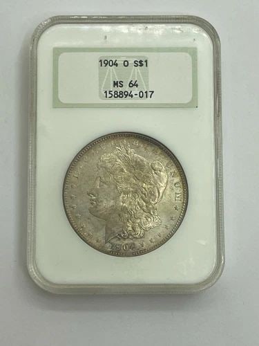 1904-O MORGAN SILVER DOLLAR $1 COIN NGC MS 64: 1904-O Morgan Silver Dollar $1 Coin .900 Fine Silver NGC Certified - MS 64 Excellent Condition & Well Kept