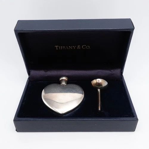 TIFFANY & CO. STERLING SILVER HEART SHAPED PERFUME BOTTLE FUNNEL SET - BOX #Q2: Vintage Tiffany & Co. Sterling Silver Heart Shaped Perfume Bottle & Funnel Set Size - 1.65" x 1.65"42mm Depth - 8mm Total Weight - 20.4 Grams With Box Included Great Vintage & Well-Kept