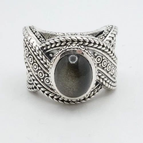 JAI JOHN HARDY STERLING SILVER CABOCHON GRAY CAT EYE STATEMENT RING SIZE 5.25: JAI JOHN HARDY STERLING SILVER CABOCHON GRAY CAT EYE STATEMENT RING SIZE 5.25 JAi by John Hardy Sterling Silver Cabochon Gray Cat Eye Statement Ring Ring Size - 5.25 Band Width - 6.5mm Depth - 2.5-3mm