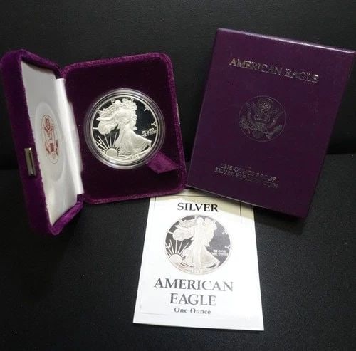 1988 S U.S MINT AMERICAN EAGLE 1 OZ SILVER PROOF DOLLAR COA & BOX #Q1: 1988 S U.S MINT AMERICAN EAGLE 1 OZ SILVER PROOF DOLLAR COA & BOX #Q1 1988 S U.S Mint American Eagle 1 Troy Oz. Silver Proof Dollar COA & Box With Purple Velvet Case Included