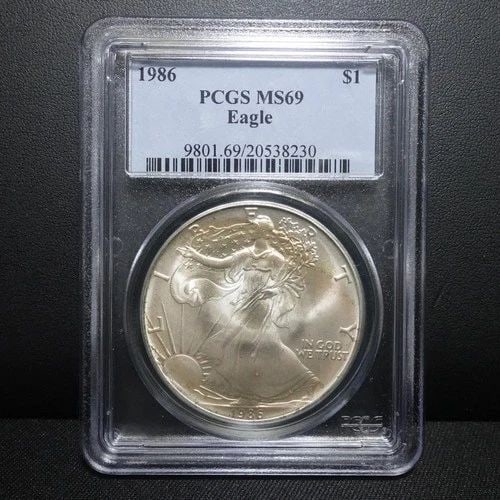1986 AMERICAN EAGLE 1 OZ SILVER DOLLAR PCGS MS69 (1 of 2)