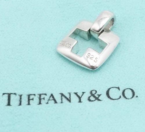 TIFFANY & CO. STERLING SILVER CUTOUT CROSS SMALL CHARM PENDANT (1 of 2)