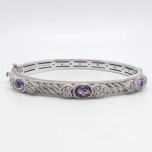 JUDITH RIPKA STERLING SILVER AMETHYST CZ CUBIC ZIRCONIA BANGLE BRACELET 7.25": JUDITH RIPKA STERLING SILVER AMETHYST CZ CUBIC ZIRCONIA BANGLE BRACELET 7.25" Judith Ripka Sterling Silver Amethyst & Clear Cubic Zirconia Hinged Bangle Bracelet Fits up to 7.25" Wrist Cuff Width - 6m
