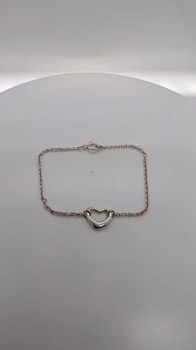 TIFFANY & CO. ELSA PERETTI STERLING SILVER OPEN HEART DAINTY BRACELET - 5.75": Tiffany & Co. Elsa Peretti Sterling Silver Open Heart Dainty Bracelet Length - 5.75" Long Total Weight - 1.2 Grams