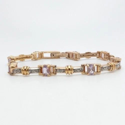 STERLING SILVER YELLOW GOLD PLATED OVAL IOLITE & DIAMOND TENNIS BRACELET 8" LONG: STERLING SILVER YELLOW GOLD PLATED OVAL IOLITE & DIAMOND TENNIS BRACELET 8" LONG Sterling Silver Yellow Gold Plated Oval Iolite & Diamond Tennis Bracelet Length - 8" Long Wrist Size - 7.25" and 7.5" C