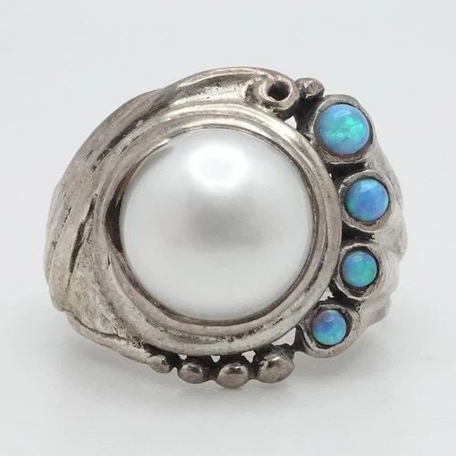STERLING SILVER 10MM ROUND PEARL & OPAL ACCENT RING SIZE 8: STERLING SILVER 10MM ROUND PEARL & OPAL ACCENT RING SIZE 8 Sterling Silver Round Pearl & Opal Accent Hammered Ring Size - 8 Band Width - 5mm Pearl Size - 10mm Unique Style & Great Find Total Weight - 