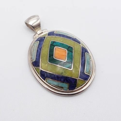 SILVER 950 PERU MULTI GEMSTONE INLAY OVAL PENDANT - 2.25": SILVER 950 PERU MULTI GEMSTONE INLAY OVAL PENDANT - 2.25" Silver 950 Peru Multi Gemstone Inlay Oval Pendant Height - 2.25" Length - 1.40" Bail Height - 8mm Bail Width - 6.5mm Total Weight - 32.3 Grams