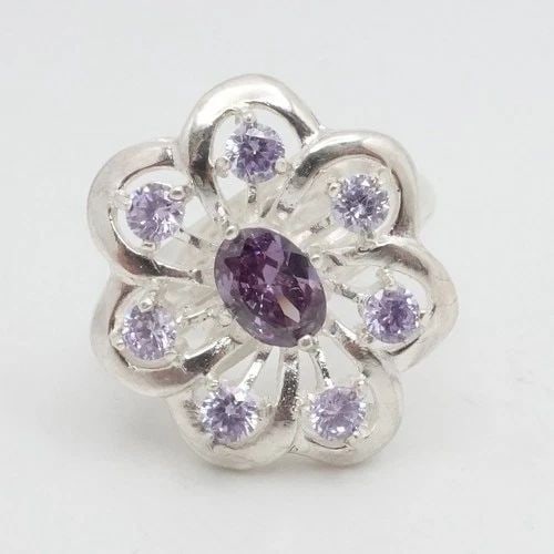 RIDER SILVER 950 PURPLE GEMSTONE FLOWER RING SIZE 7.5: RIDER SILVER 950 PURPLE GEMSTONE FLOWER RING SIZE 7.5 Rider Silver 950 Purple Gemstone Flower Ring Size - 7.5 Band Width - 3mm Height - 20mm Total Weight - 7.2 Grams