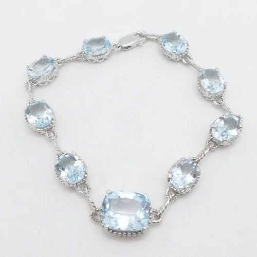 SIGNED QJ STERLING SILVER BLUE TOPAZ CHAIN LINK BRACELET SIZE 7.5" LONG: SIGNED QJ STERLING SILVER BLUE TOPAZ CHAIN LINK BRACELET SIZE 7.5" LONG Signed QJ Sterling Silver Blue Topaz Chain Link Bracelet Length - 7.5" Wrist Size - Relax 6.75" - 7" Snug Gemstone Height - 8mm