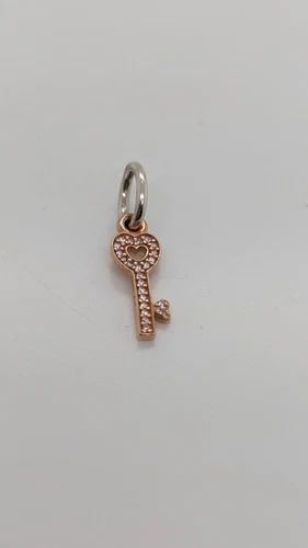 AUTHENTIC PANDORA 14K ROSE GOLD TRUST KEY HEART RETIRED DANGLE CHARM ALE 585: AUTHENTIC PANDORA 14K ROSE GOLD TRUST KEY HEART RETIRED DANGLE CHARM ALE 585 Authentic Pandora 14K Rose Gold Trust Key Heart Retired Dangle Charm ALE 585 Style # 791358CZ Est. Retail - $120 USD