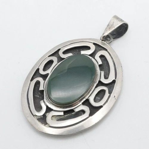 TAXCO CAC STERLING SILVER MEXICO GREEN AGATE PUFFED OVAL PENDANT 2.25": TAXCO CAC STERLING SILVER MEXICO GREEN AGATE PUFFED OVAL PENDANT 2.25" Taxco CAC Signed Sterling Silver Mexico Green Agate Puffed Oval Pendant Length - 2.25" Width - 34mm Depth - 7mm Thick Bail Size (