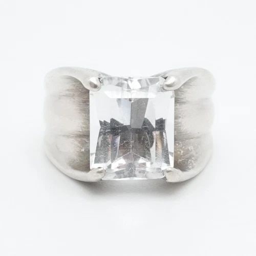 NF STERLING SILVER EMERALD CUT CLEAR CUBIC ZIRCONIA RING SIZE 7.25: NF STERLING SILVER EMERALD CUT CLEAR CUBIC ZIRCONIA RING SIZE 7.25 Signed NF Sterling Silver Clear Cubic Zirconia Emerald Cut Ring Size - 7.25 Band Width - 5mm Stone Size - 10mm x 8mm Total Weight - 7