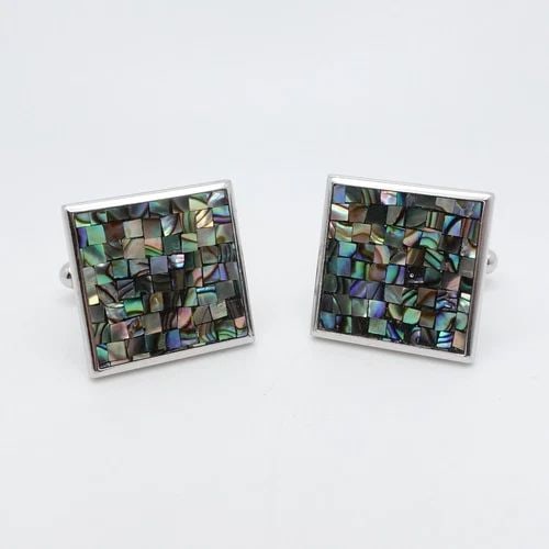 STERLING SILVER SQUARE MOTHER OF PEARL INLAY BULLET BACK CUFFLINKS: STERLING SILVER SQUARE MOTHER OF PEARL INLAY BULLET BACK CUFFLINKS Sterling Silver Square Mother of Pearl Inlay Bullet Back Cufflinks Height -18mm Total Weight - 15.2 Grams Hallmark - 925