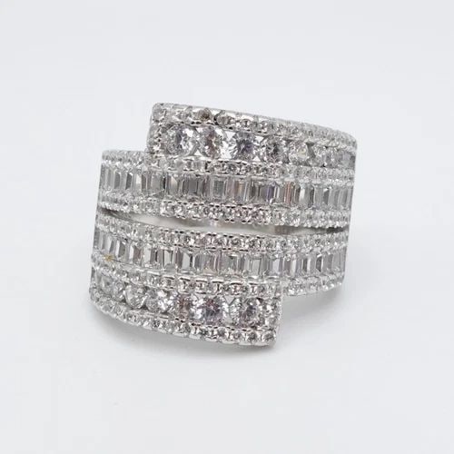 STERLING SILVER PAVE ROUND & BAGUETTE CLEAR CUBIC ZIRCONIA WIDE RING - SIZE 6.75: STERLING SILVER PAVE ROUND & BAGUETTE CLEAR CUBIC ZIRCONIA WIDE RING - SIZE 6.75 Sterling Silver Pave Round & Baguette Clear Cubic Zirconia Wide Ring Size - 6.75 Band Width - 4mm Total Weight - 8 Gram