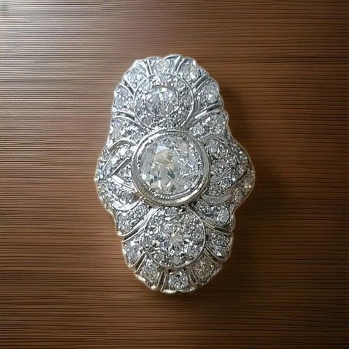 4.64CT. PLATINUM VINTAGE FILIGREE ENGAGEMENT RING NATURAL EURO CUT DIAMOND 1930S: 4.64CT. PLATINUM VINTAGE FILIGREE ENGAGEMENT RING NATURAL EURO CUT DIAMOND 1930S This stunning Art Deco filigree engagement ring, dating to circa the 1930s, is beautifully crafted in Platinum 900 and 