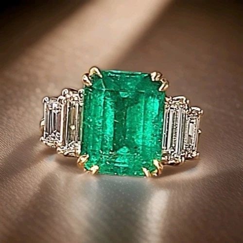 18K MULTI-TONE GOLD ENGAGEMENT RING 5.95CT. NATURAL COLOMBIAN EMERALD GIA CERT: 18K MULTI-TONE GOLD ENGAGEMENT RING 5.95CT. NATURAL COLOMBIAN EMERALD GIA CERT This exquisite vintage ring showcases a magnificent 5.95 carat natural Colombian emerald, expertly cut in a classic emera
