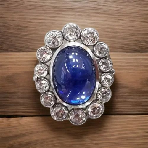 PLATINUM VINTAGE RING NATURAL UNTREATED BLUE CABOCHON SAPPHIRE 7.35CT GIA CERT: PLATINUM VINTAGE RING NATURAL UNTREATED BLUE CABOCHON SAPPHIRE 7.35CT GIA CERT Gorgeous Vintage natural blue sapphire SET platinum ring center natural blue sapphire untreated oval cabochon shape weigh