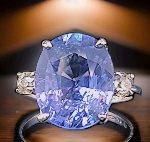 10.28CT.NATURAL UNTREATED BLUE SAPPHIRE 14K WHITE GOLD VINTAGE RING GIA CERT: 10.28CT.NATURAL UNTREATED BLUE SAPPHIRE 14K WHITE GOLD VINTAGE RING GIA CERT A breathtaking vintage 14K white gold engagement ring showcasing a magnificent 10.28 carat natural blue sapphire in an eleg