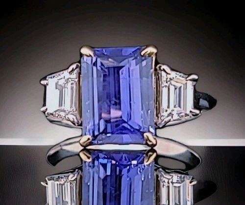 PLATINUM ENGAGEMENT RING 2.91CT. NATURAL UNTREATED BLUE SAPPHIRE EMERALD CUT GIA: PLATINUM ENGAGEMENT RING 2.91CT. NATURAL UNTREATED BLUE SAPPHIRE EMERALD CUT GIA This extraordinary engagement ring is masterfully crafted in platinum and 18K yellow gold, showcasing a breathtaking na
