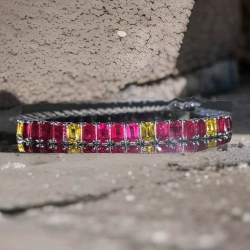 18K WHITE GOLD NATURAL RUBY & YELLOW SAPPHIRE BRACELET – 28.19CTW, 7 INCHES: 18K WHITE GOLD BRACELET NATURAL YELLOW SAPPHIRE RUBY 28.19CT. GORGEOUS 18K WHITE GOLD DIAMOND RUBY SAPPHIRE BRACELET SET WITH NATURAL RUBY IN EMERALD CUT TOTAL WEIGHT 21.26CTS SIZE 5X3MM SET WITH NATU