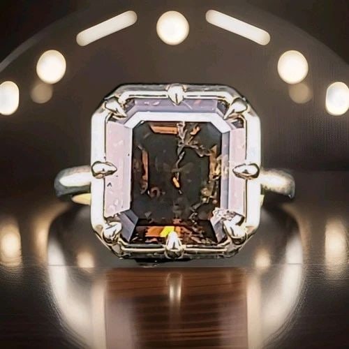 14K YELLOW GOLD ENGAGEMENT RING 4.46CT.NATURAL ASSCHER CUT CHAMPAGNE DIAMOND: 14K YELLOW GOLD ENGAGEMENT RING 4.46CT.NATURAL ASSCHER CUT CHAMPAGNE DIAMOND This exquisite vintage ring is crafted in solid 14K yellow gold and features a stunning natural dark champagne diamond at i