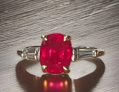 2.78CT.NATURAL BURMA OVAL RUBY PLATINUM 14K GOLD ENGAGEMENT VINTAGE RING GIA: 2.78CT.NATURAL BURMA OVAL RUBY PLATINUM 14K GOLD ENGAGEMENT VINTAGE RING GIA A breathtaking engagement ring crafted in platinum and 14K yellow gold, featuring a captivating natural heated Burmese ruby