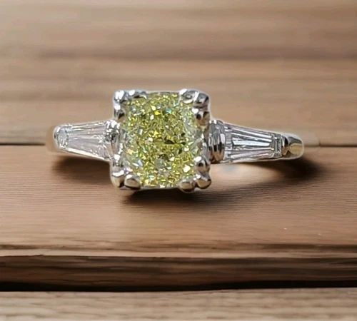 VINTAGE 14K WHITE GOLD ENGAGEMENT RING 1.50CT.NATURAL CUSHION YELLOW DIAMOND GIA: VINTAGE 14K WHITE GOLD ENGAGEMENT RING 1.50CT.NATURAL CUSHION YELLOW DIAMOND GIA Vintage 14k white gold engagement Ring. Center natural yellow diamond cushion shape diamond Weight 1.50CT SIZE 6.9x5.9m