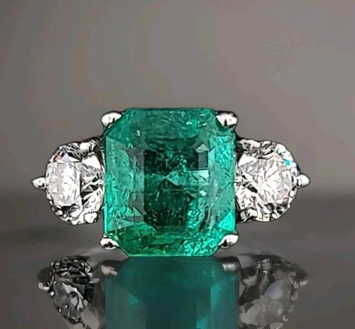 VINTAGE PLATINUM ENGAGEMENT RING 3.68CT. NATURAL GREEN EMERALD GIA CERT.: VINTAGE PLATINUM ENGAGEMENT RING 3.68CT. NATURAL GREEN EMERALD GIA CERT. GORGEOUS vintage platinum engagement ring gem natural green emerald in an emerald shape Center emerald weight 3.68ct. size 10.1