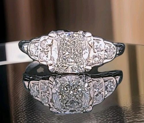 VINTAGE PLATINUM ENGAGEMENT RING 1.71CT.NATURAL CUSHION DIAMOND GIA CERT 1930'S: Vintage Platinum Engagement Ring 1.71ct.Natural Cushion Diamond GIA Cert 1930's A stunning vintage filigree engagement ring crafted in solid platinum, dating to the 1930s—an era known for its intric