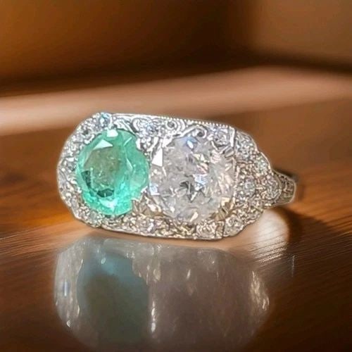 VINTAGE FILIGREE 14K WHITE RING 2.34CT. NATURAL DIAMOND GREEN COLOMBIA EMERALD: VINTAGE FILIGREE 14K WHITE RING 2.34CT. NATURAL DIAMOND GREEN COLOMBIA EMERALD This exquisite vintage Art Deco ring is crafted in 14K white gold and features a 1.26 ct natural Old European cut diamond