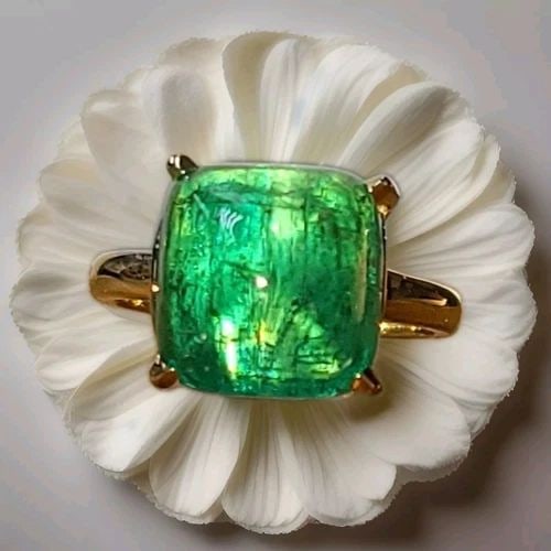 VINTAGE 14K YELLOW GOLD ENGAGEMENT RING 8.48CT.NATURAL GREEN EMERALD CABOCHON: VINTAGE 14K YELLOW GOLD ENGAGEMENT RING 8.48CT.NATURAL GREEN EMERALD CABOCHON This vintage 14k yellow gold engagement ring features an 8.48CT natural green emerald cabochon as the main stone. The Cabo