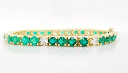 18K YELLOW GOLD BRACELET 15.22CT.LAB-GROWN GREEN EMERALD & NATURAL DIAMOND: 18K YELLOW GOLD BRACELET NATURAL ROUND GREEN EMERALD DIAMONDS 17.32CT. SI2-H This stunning 18k yellow gold bracelet features a natural round green emerald and sparkling diamonds with a total carat wei